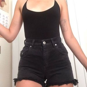 Vintage black Levi’s high waisted jean shorts